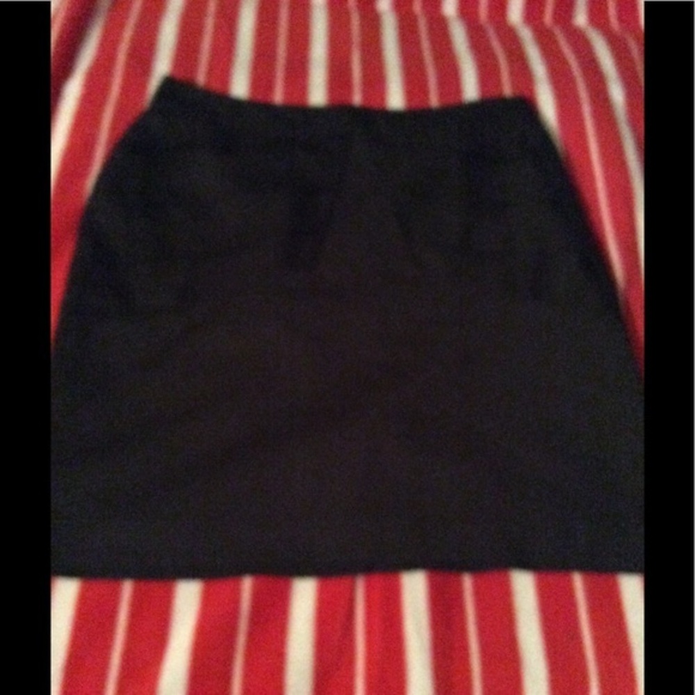 Mini black skirt.